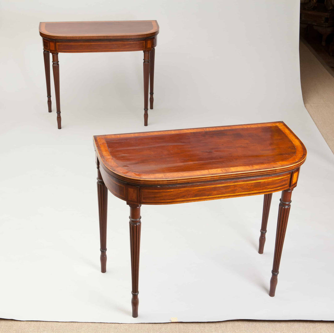 Pair Of George III Hepplewhite Mahogany Card Tables Attributed To Gillows with satinwood banding and fluted legs.