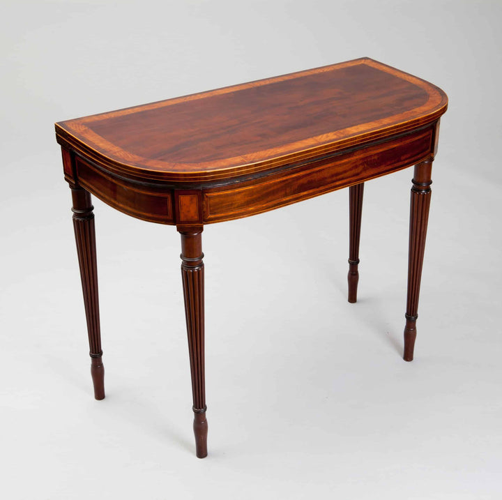 Pair Of George III Hepplewhite Mahogany Card Tables Attributed To Gillows with satinwood banding and fluted legs.