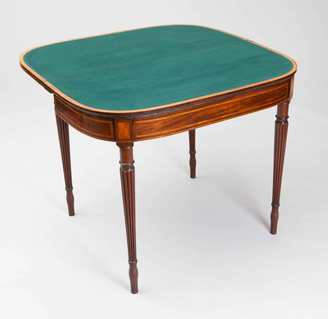 Pair Of George III Hepplewhite Mahogany Card Tables Attributed To Gillows with satinwood banding and fluted legs.