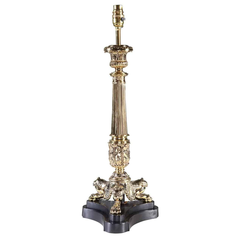 A Polished Brass Column Tripod Table Lamp AJ3 with ornate details and black tripod base, England circa 1980.