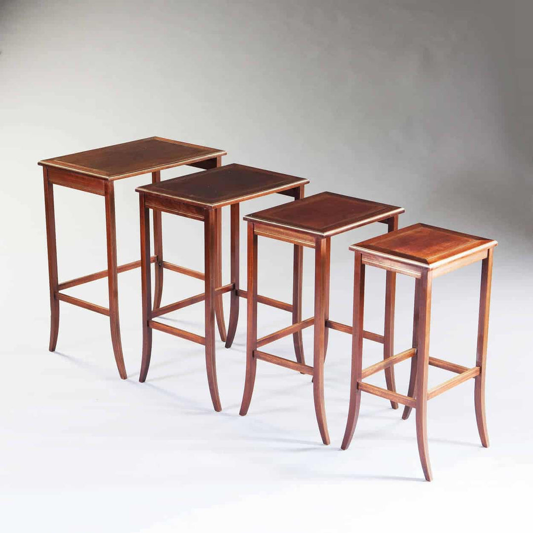 Nest Of Four Antique Mahogany And Brass Inlaid Tables