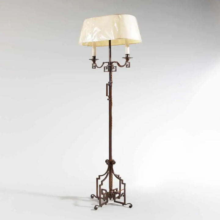 A patinated Steel floor standing bouillotte lamp