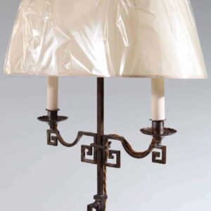 A patinated Steel floor standing bouillotte lamp