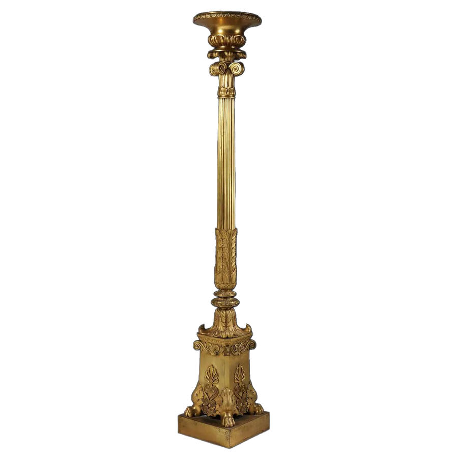 Empire Gilt Bronze Torchere Candle Stand with fluted column, foliate details, and paw feet, circa 1850 French design.