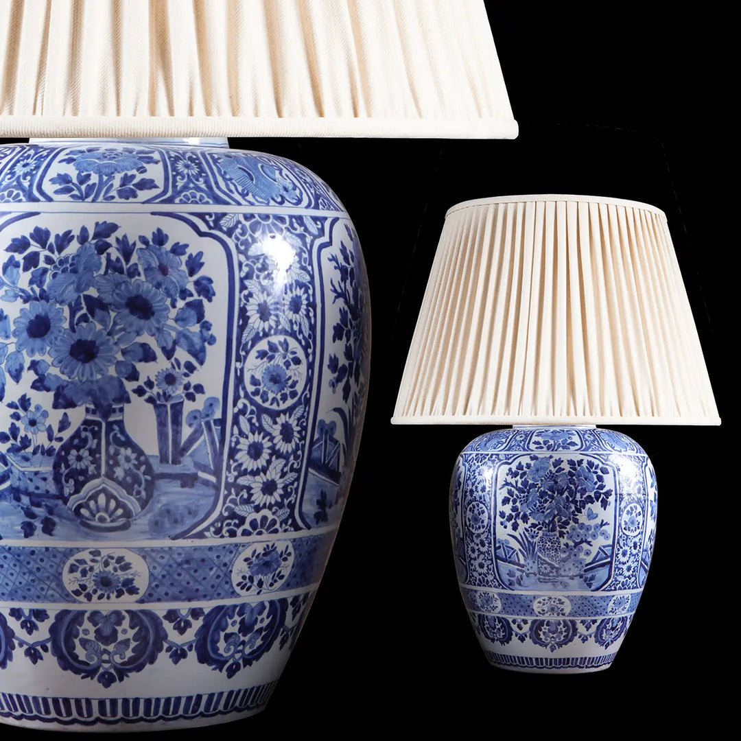Large Pair of Blue and White Delft Table Lamps featuring 19th-century Dutch floral designs on ceramic vases.