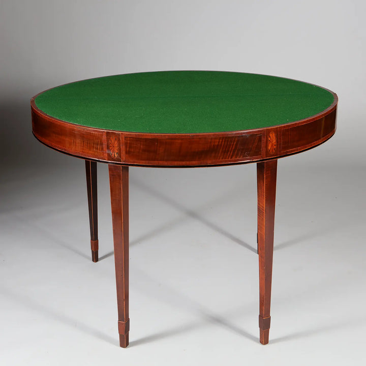 George III Irish Demi Lune Card Table with green baize top, satinwood fan, and elegant tapered legs circa 1780.
