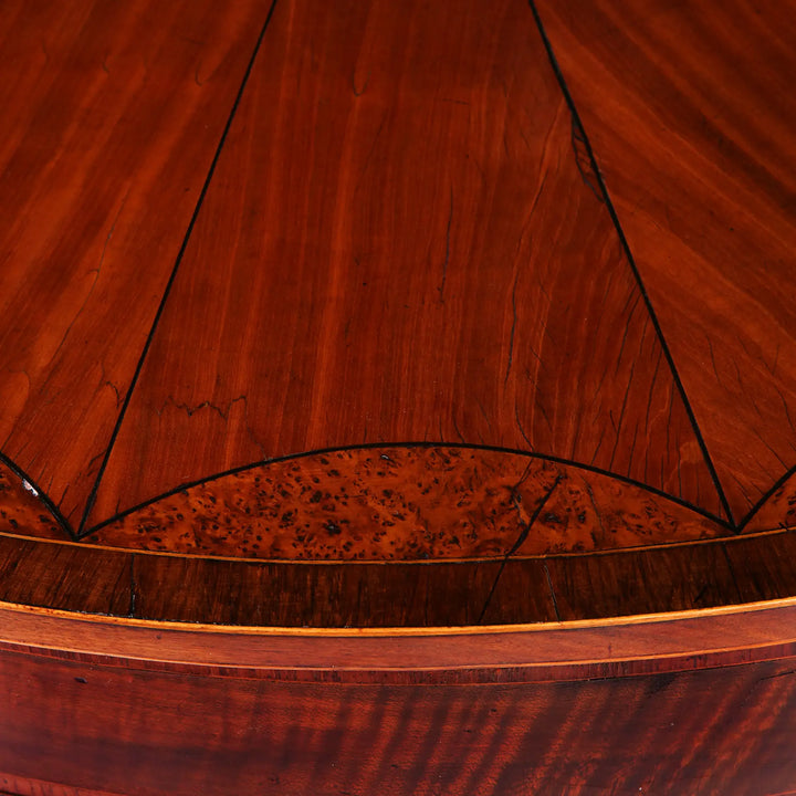Close-up of the wood grain and satinwood details on the George III Irish Demi Lune Card Table circa 1780.