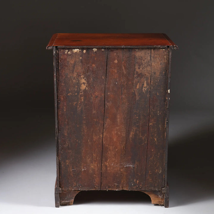 George I Pedestal Chest of Drawers in mahogany with four brass-handled drawers, ogee bracket feet, circa 1725 England.