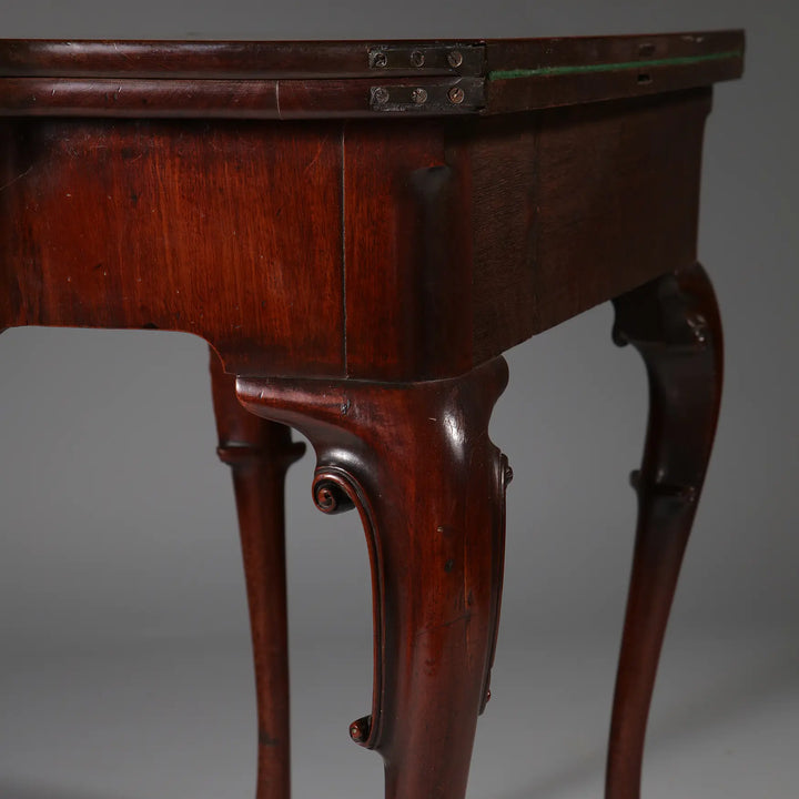 George II Mahogany Card Table with cabriole legs and elegant acanthus carvings, circa 1735 England.