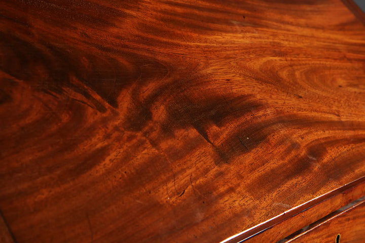 George III Bureau Desk Chest of Drawers showcasing rich grained timber and polished mid-18th century wooden surface detail.