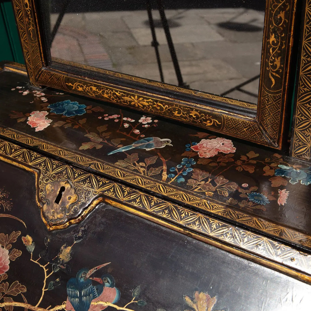 Chinese Export Lacquer Bureau-On-Stand and Toilet Glass with rare polychrome floral and bird design circa 1730.