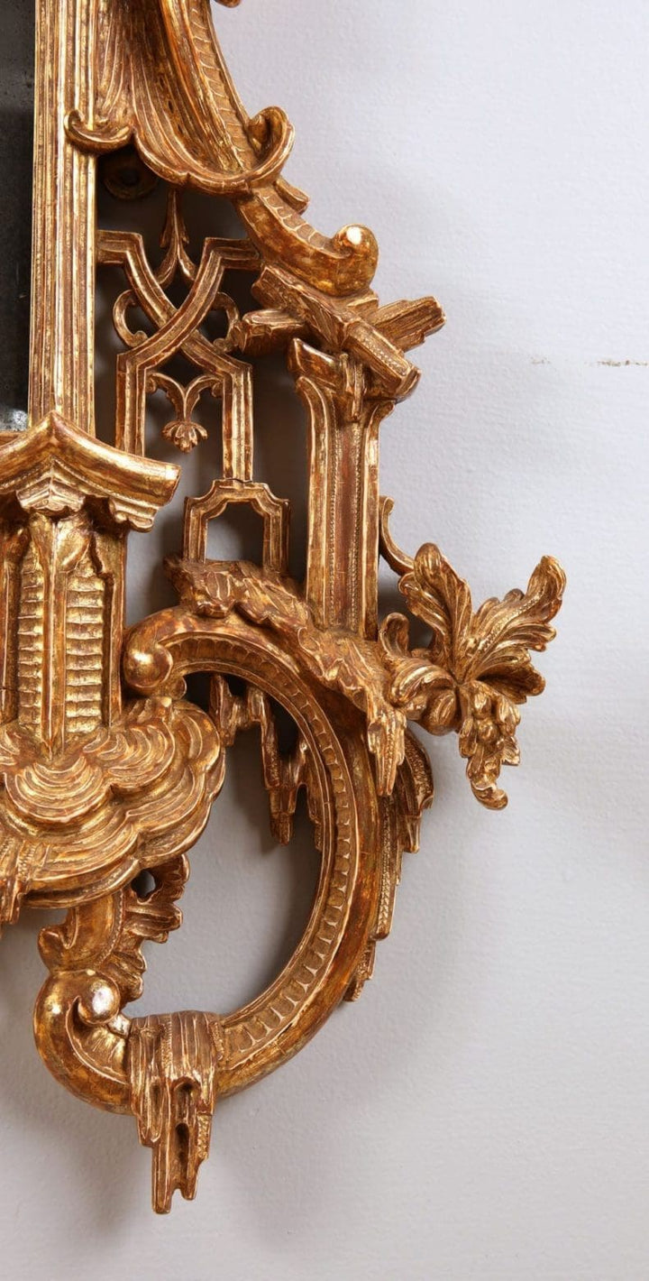 Close-up of ornate giltwood carvings on the George III Giltwood Pier Mirror 175x94cm with rococo and chinoiserie details.