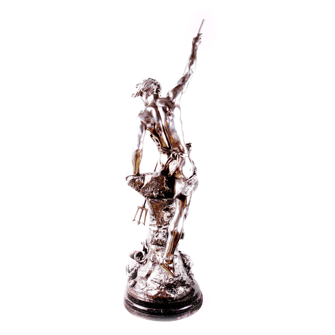 Italian Solid Silver Statue of Young Neptune holding a trident, standing on a detailed base with aquatic elements.