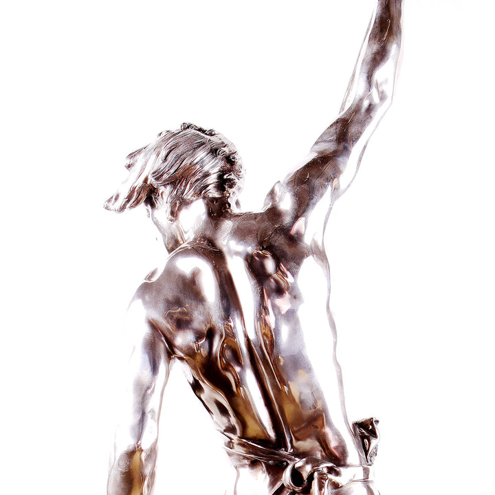 Italian Solid Silver Statue of Young Neptune showing detailed muscular back and raised arm against white background