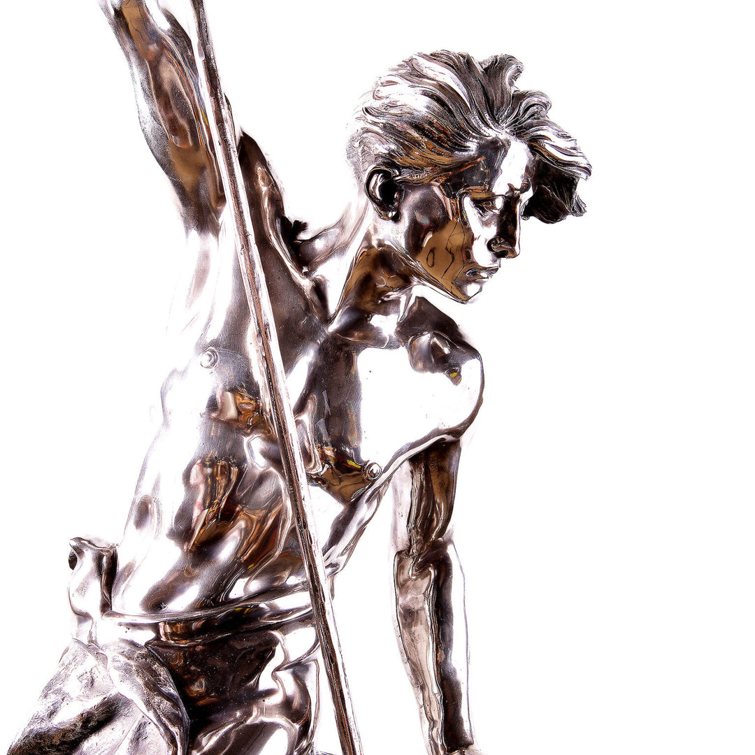 Italian Solid Silver Statue of Young Neptune holding a trident with detailed craftsmanship and polished finish