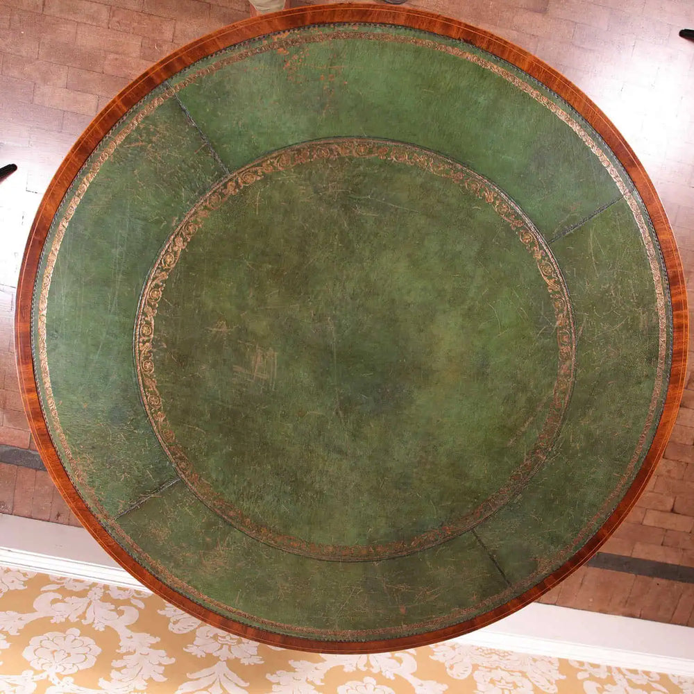 Sheraton Mahogany Drum Table with tooled leather top, crossbanded mahogany border, and pedestal base with outswept legs.