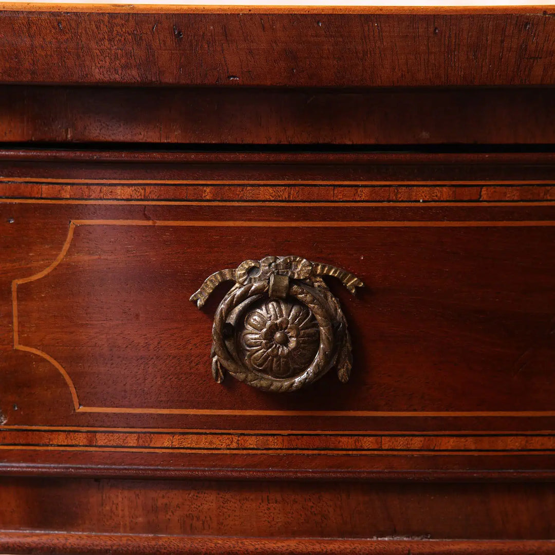 Sheraton Mahogany Drum Table close-up of a drawer with intricate brass handle and mahogany wood finish detailing.