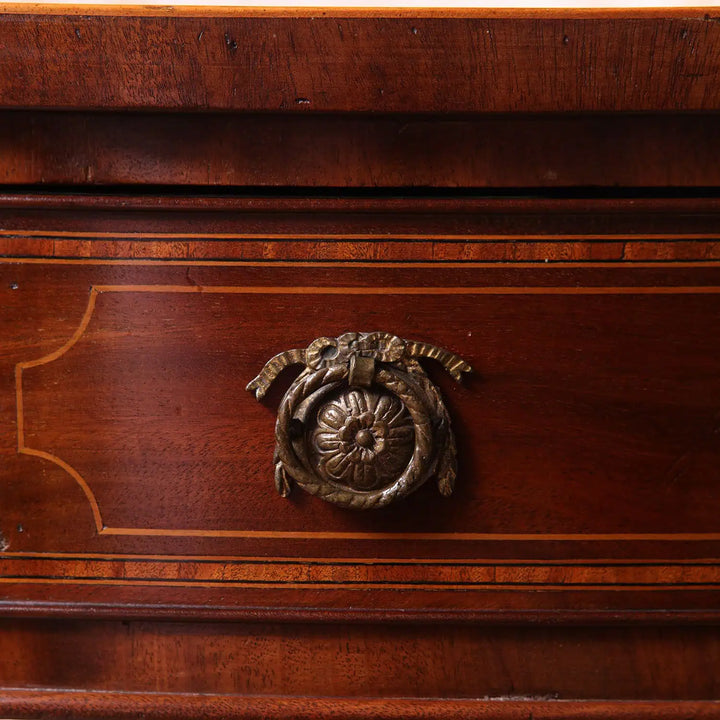 Sheraton Mahogany Drum Table close-up of a drawer with intricate brass handle and mahogany wood finish detailing.