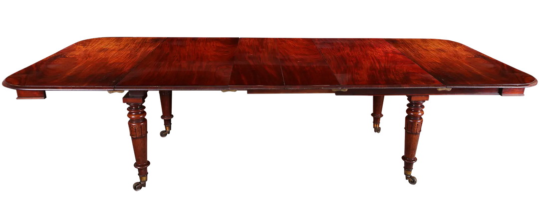 Extending Antique Dining Table in Flame Mahogany with telescopic design and carved legs, antique 19th-century style.