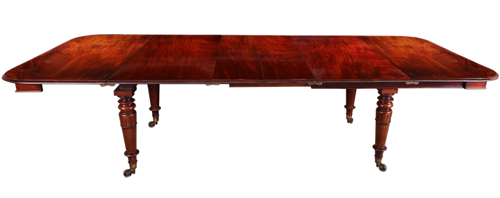 Extending Antique Dining Table in Flame Mahogany with telescopic design and carved legs, antique 19th-century style.