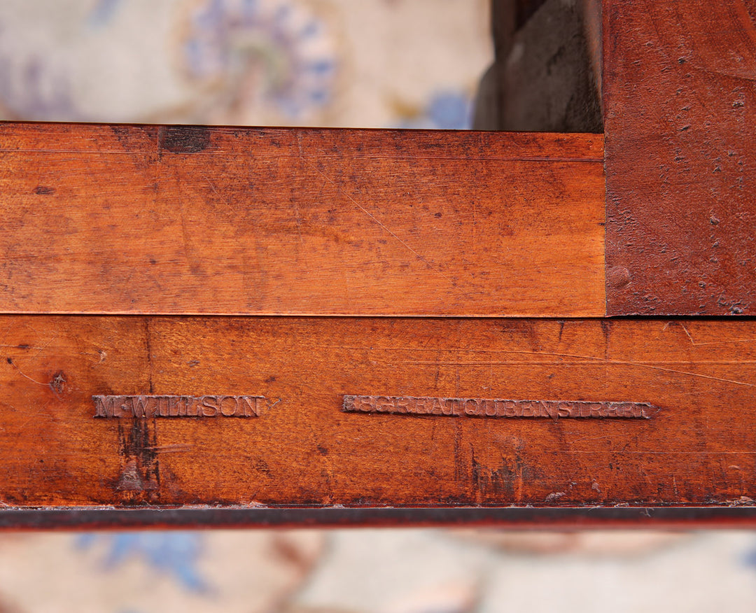 Extending Antique Dining Table in Flame Mahogany close-up of oak telescopic mechanism with M.WILLSON stamp on wood bearer