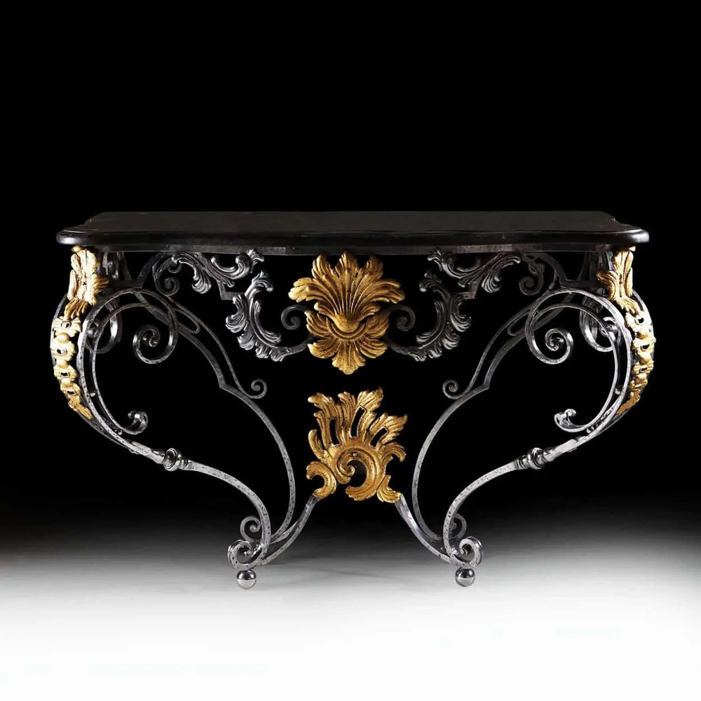 Louis XV Steel and Gilt Metal Console Table with ornate scrolls and gilt foliate accents on black background.