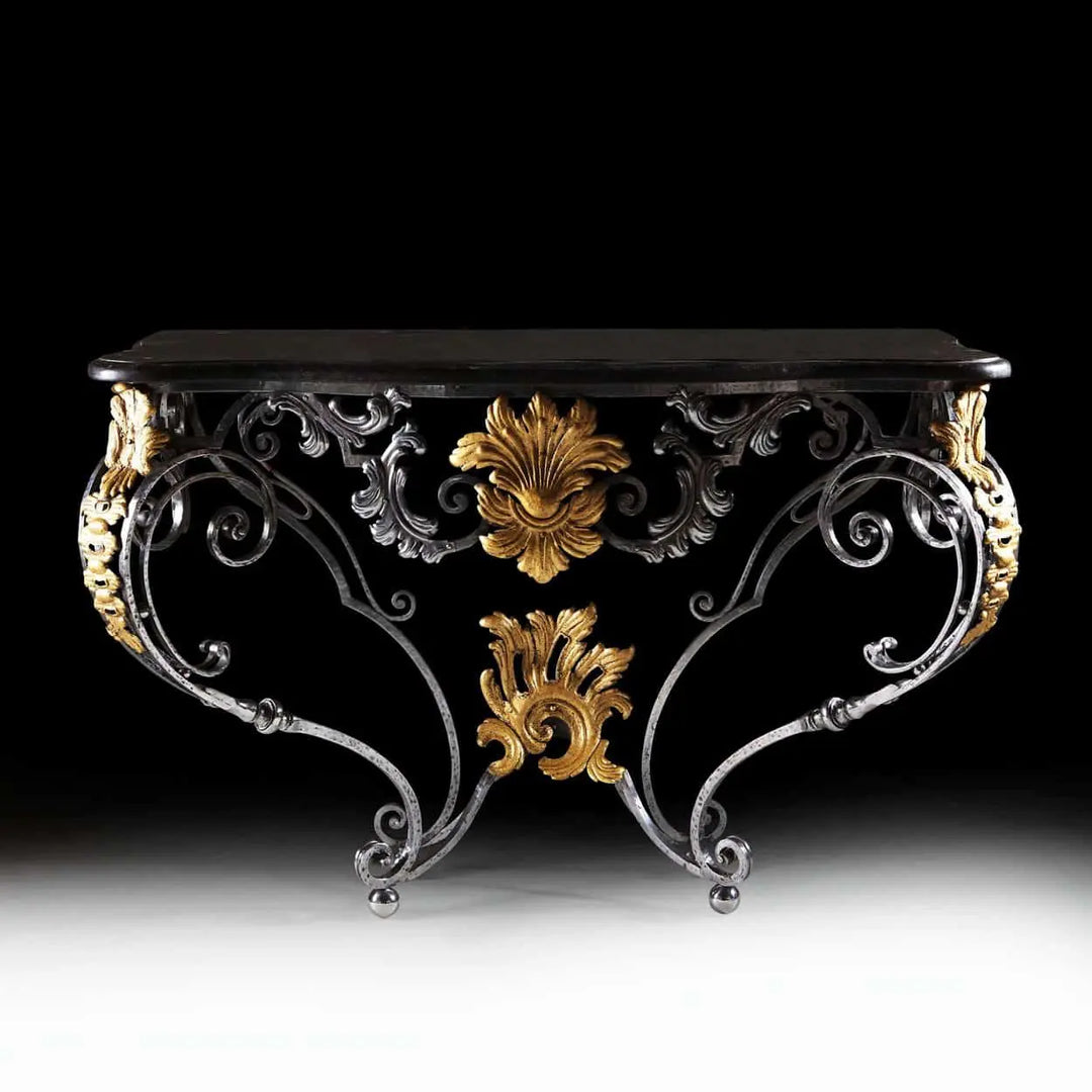 Louis XV Steel and Gilt Metal Console Table with ornate scrolls and gilt foliate accents on black background.