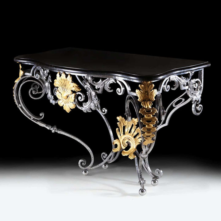 Louis XV Steel and Gilt Metal Console Table with ornate scrolls and gilt foliate details, circa 1840, French Rococo revival style.
