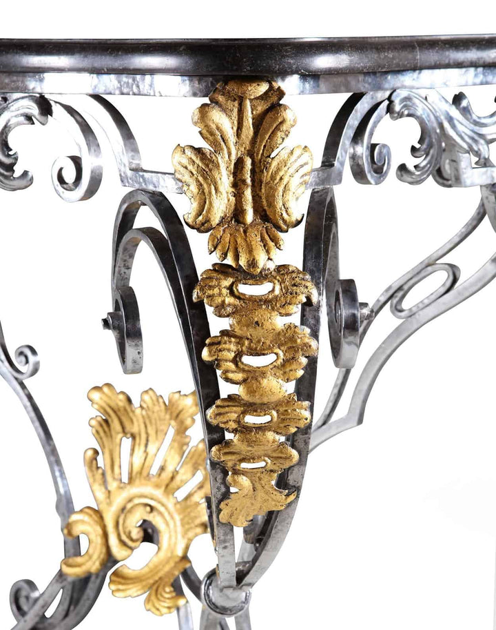 Louis XV Steel and Gilt Metal Console Table with ornate gilt foliate scrollwork and wrought steel detailing.