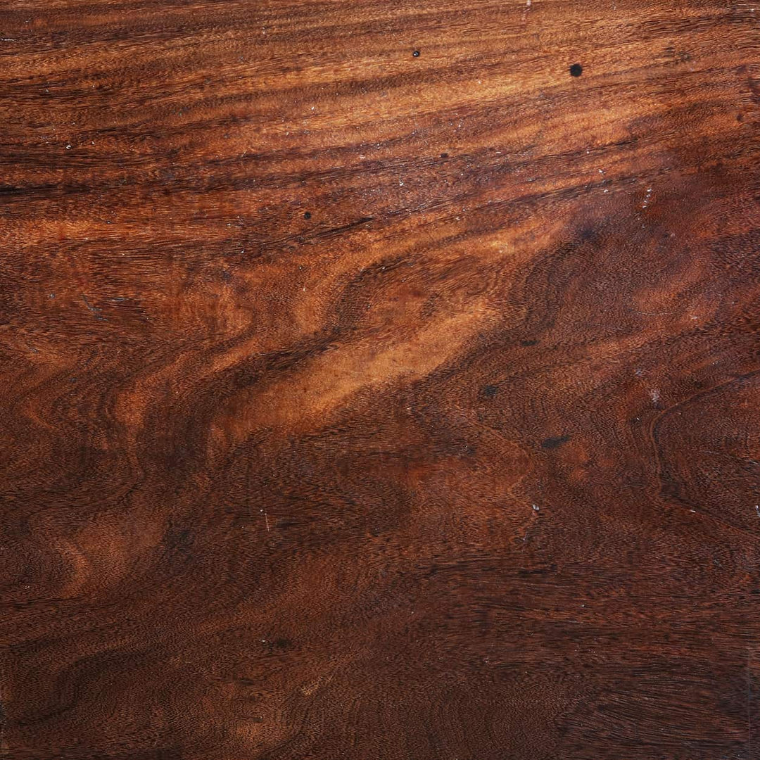 Ceylonese Writing Table wooden surface close-up showing rich grain and texture with warm brown tones.