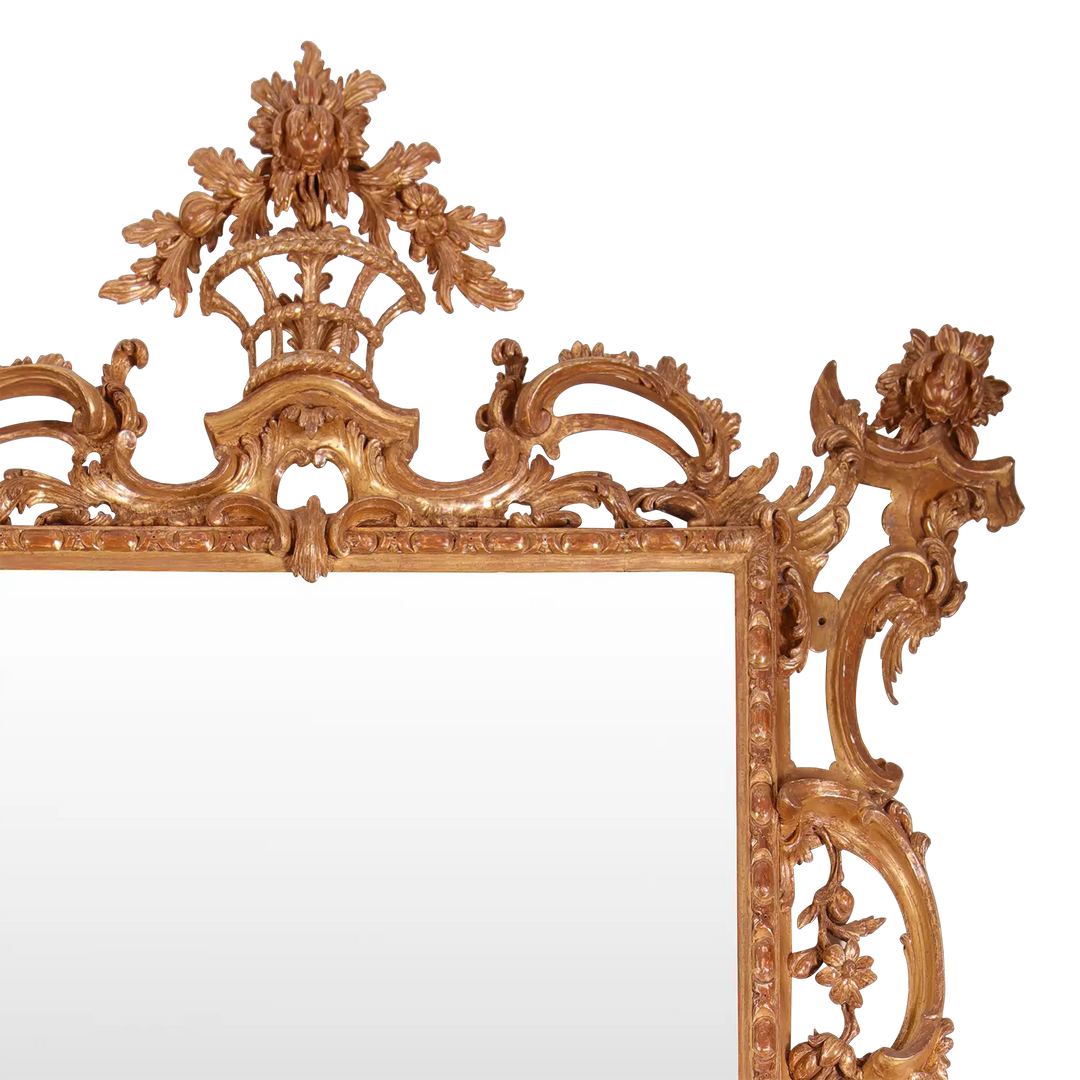 George II Giltwood Pier Mirror with mid-18th century rococo carved giltwood frame detailed with flowers and scrolls.