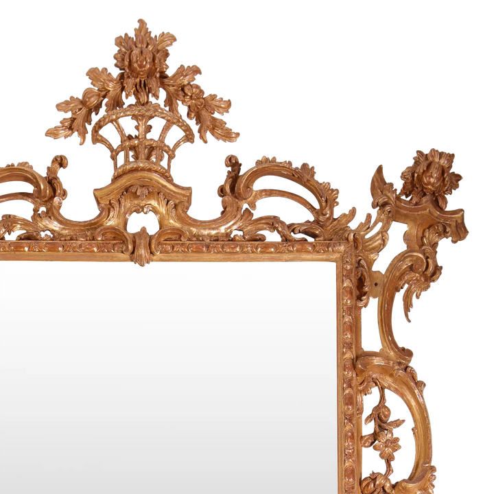 George II Giltwood Pier Mirror with mid-18th century rococo carved giltwood frame detailed with flowers and scrolls.