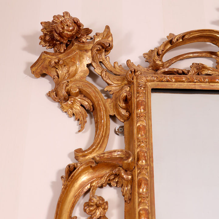 George II Giltwood Pier Mirror with intricate rococo giltwood carving and floral acanthus leaf details circa 1740.