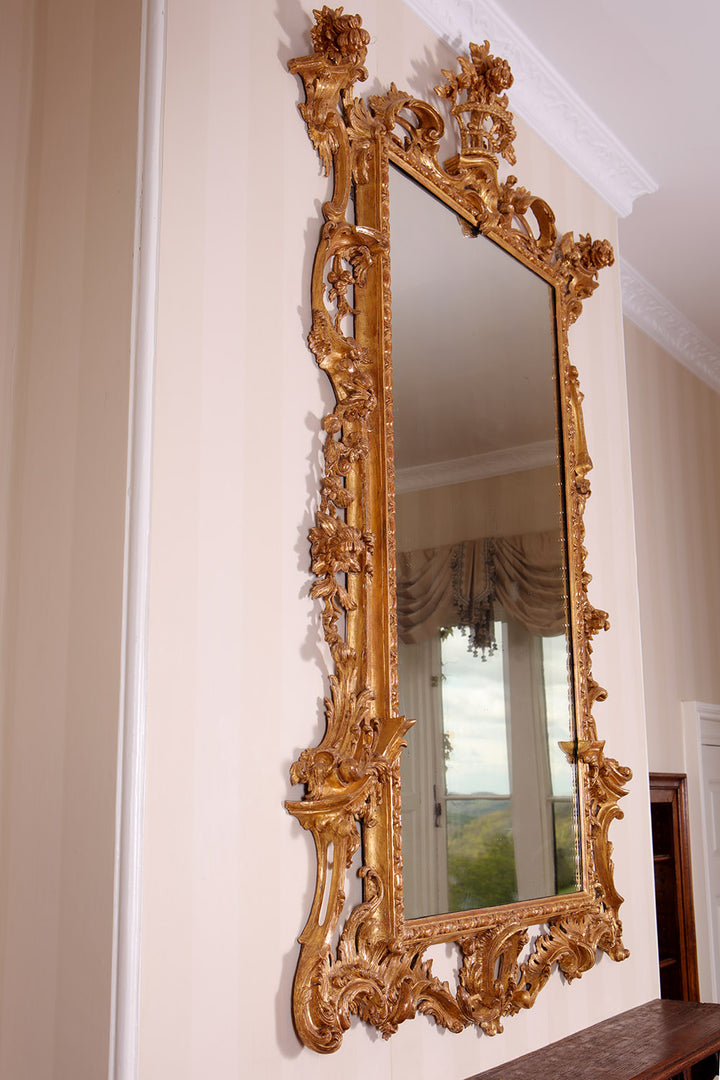 George II Giltwood Pier Mirror with intricate carved giltwood frame and rococo acanthus leaf details circa 1740.