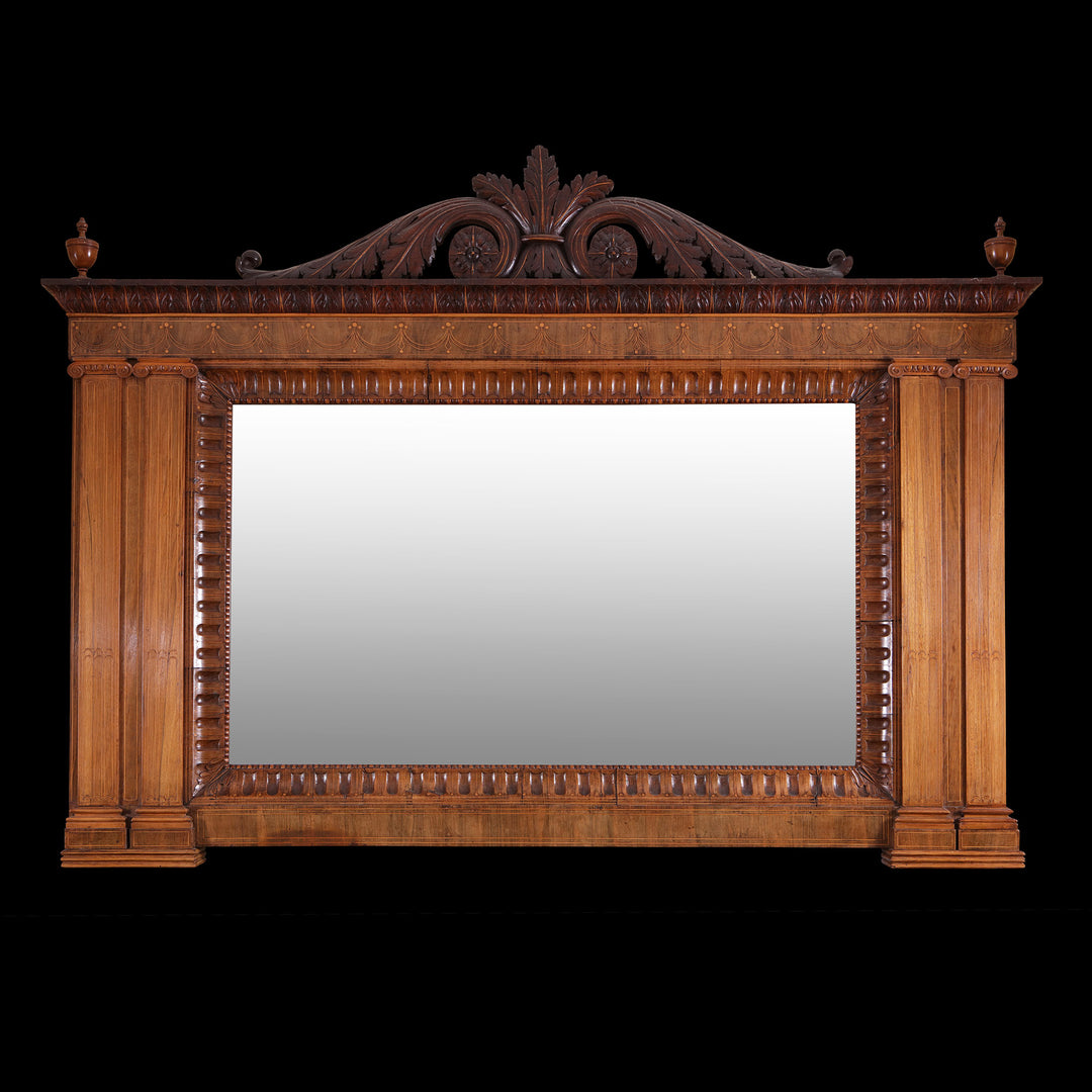 Mahogany Overmantel Mirror in the Manner of Robert Adam with carved acanthus leaf scroll and ionic pilasters.