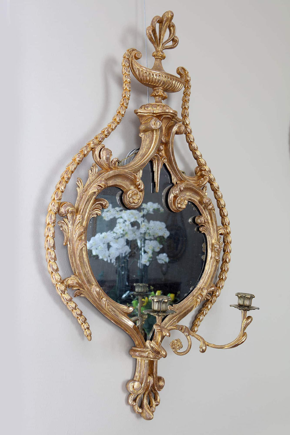A fine pair of giltwood girandoles English 19th Century in the manner of William France ornate wall sconces