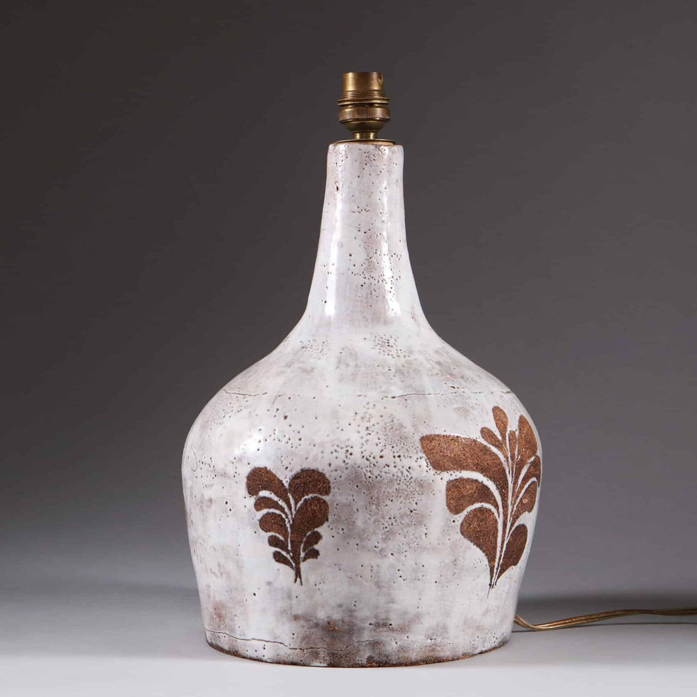 French Mid-Century Glazed Ceramic Table Lamp with white biscuit leaf motif ceramic base, 32 cm high, rewired for modern use.