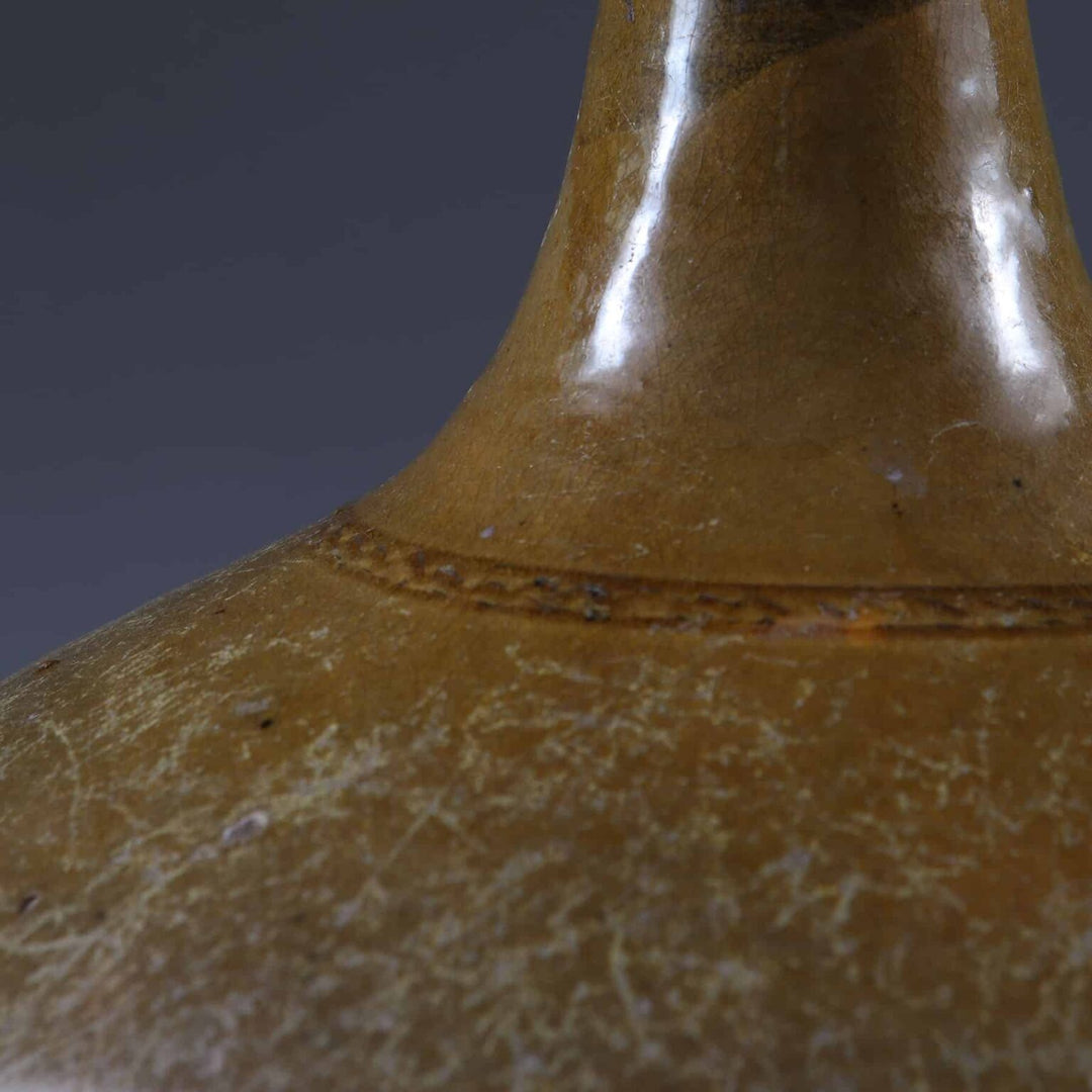 Ceramic Glazed Bottle Vase Mounted as a Table Lamp with glossy brown finish and antique texture close-up view