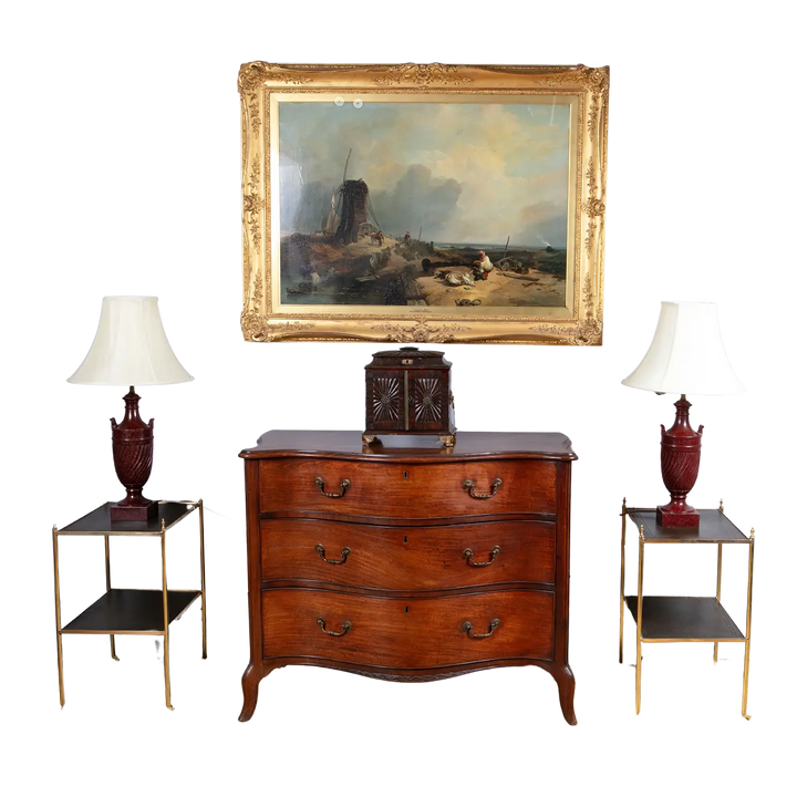 Pair of Brass and Leather Etagere End Tables with gilt tooled leather tops and brass legs with castors, circa 2000.