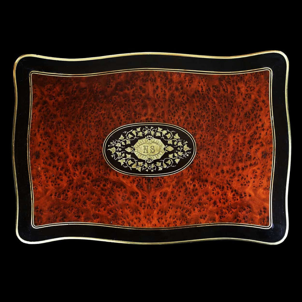 Paul Sormani Exotic Amboyna Work Table top view showcasing rich Amboyna veneer with ebony and brass inlay details.