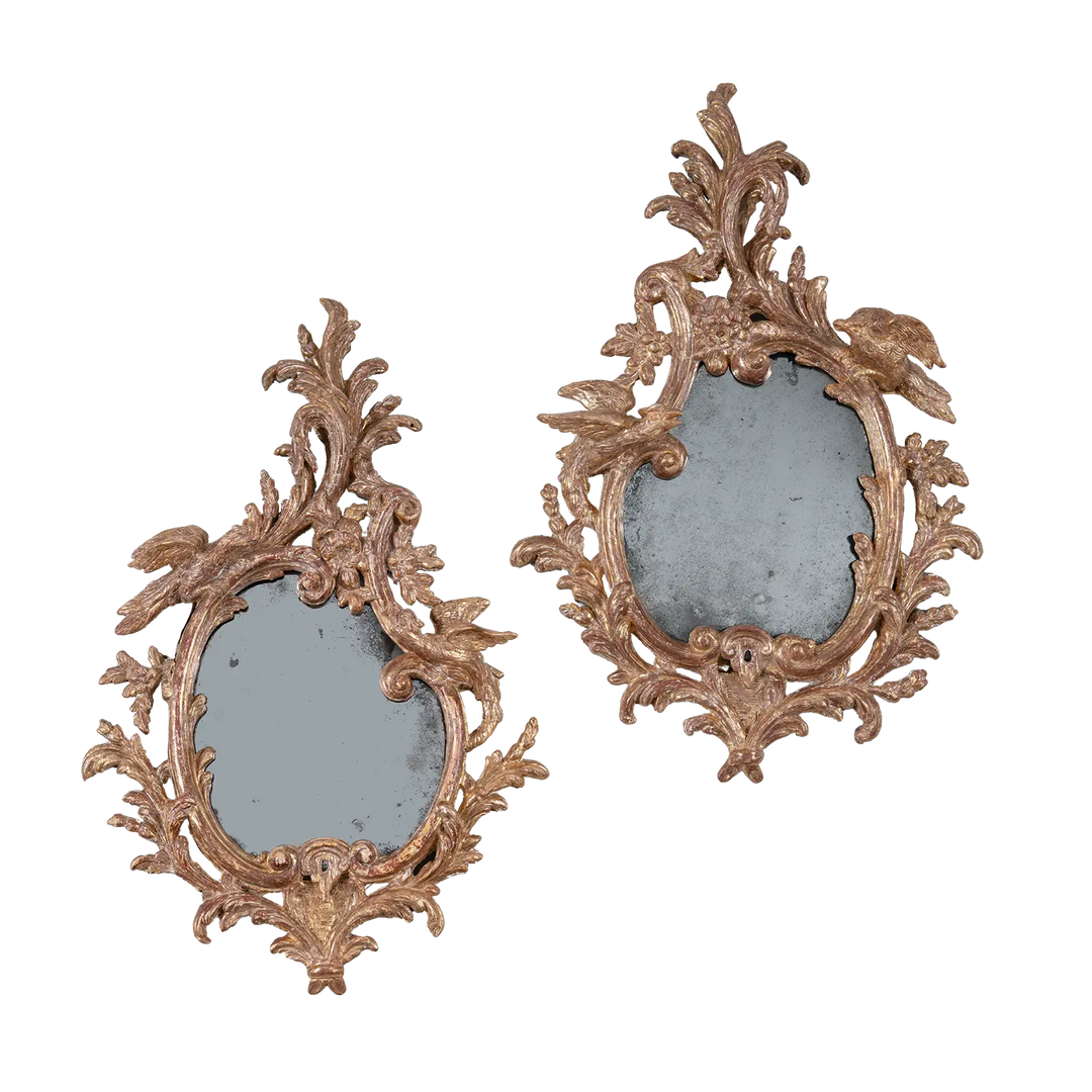 Pair of 18th Century Gilt Carton Pierre Wall Mirrors with rococo scrolls and dragon motifs, England circa 1755.
