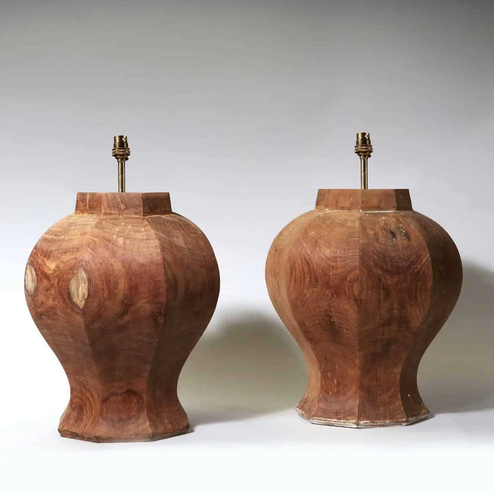 A Pair of Faceted Octagonal Wooden Lamps with a natural wood finish, France circa 2000, 37 cm diameter, 43 cm height.