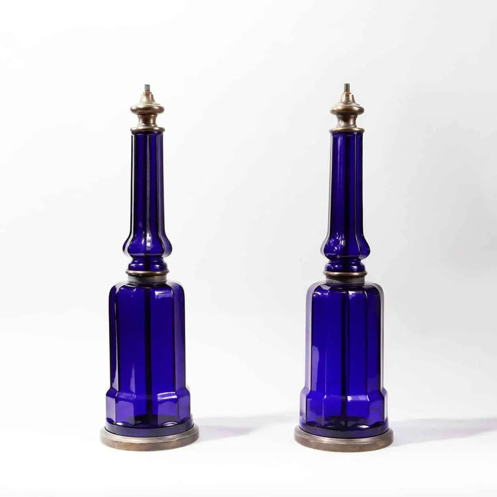 Pair of Blue Glass Column Table Lamps with rich blue glass and patinated metal bases and tops, 53 cm tall.
