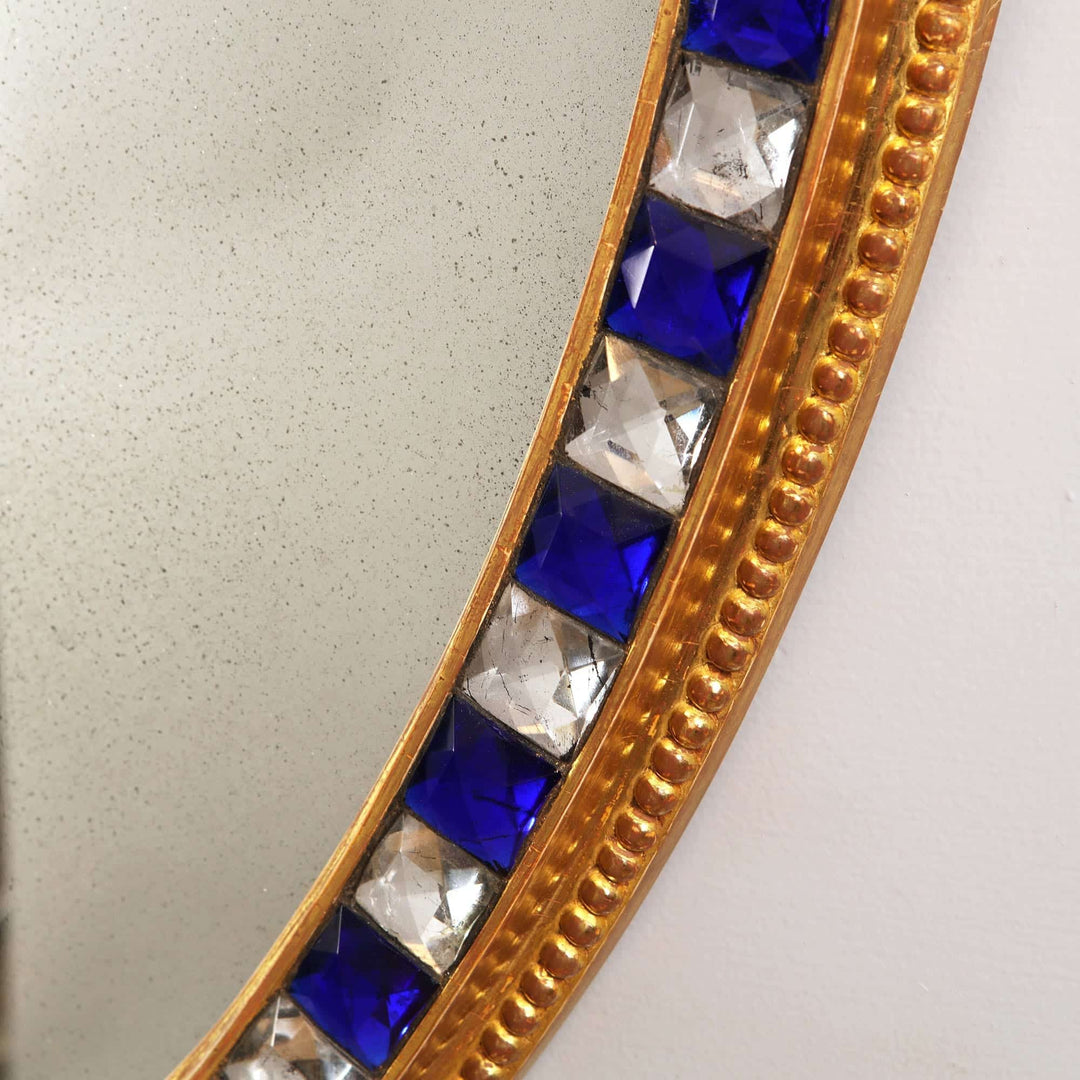 Large Scale 5ft Oval Blue and Clear Border Glass Mirror with ornate giltwood frame and cut glass cabochons detail.