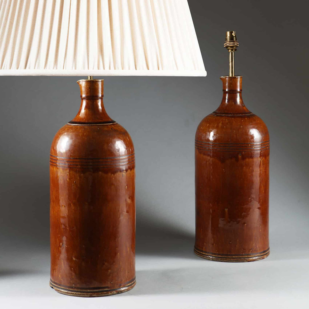 Pair of Lustrous Brown Indian Ink Bottles Mounted as Table Lamps