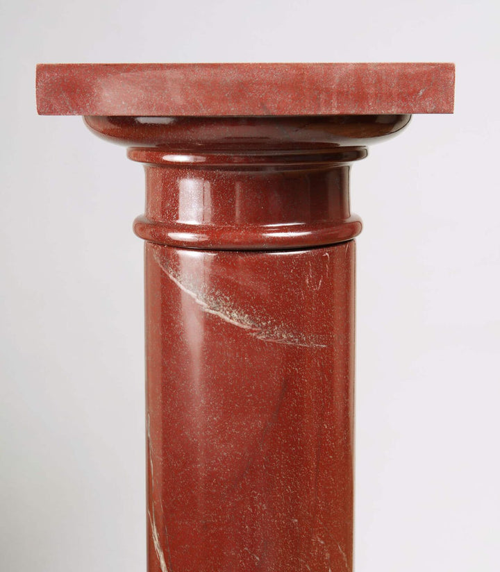 Rosso Marble Pedestal polished red marble column with turned base and rotating capital, Italian design circa 1900.