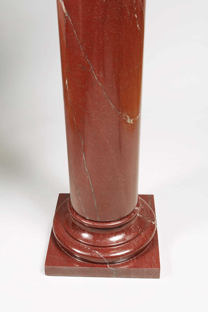 Rosso Marble Pedestal with polished red marble column, turned base on plinth, and rotating turned capital, Italy circa 1900.