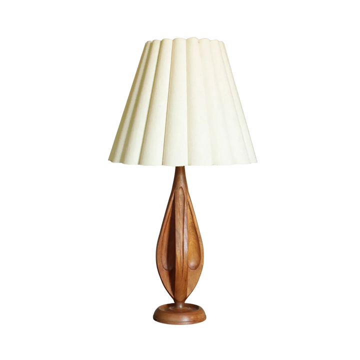 Mid Century Wooden Lamp and Shade with a 76 cm height, wooden sculpted base, and pleated white lamp shade.