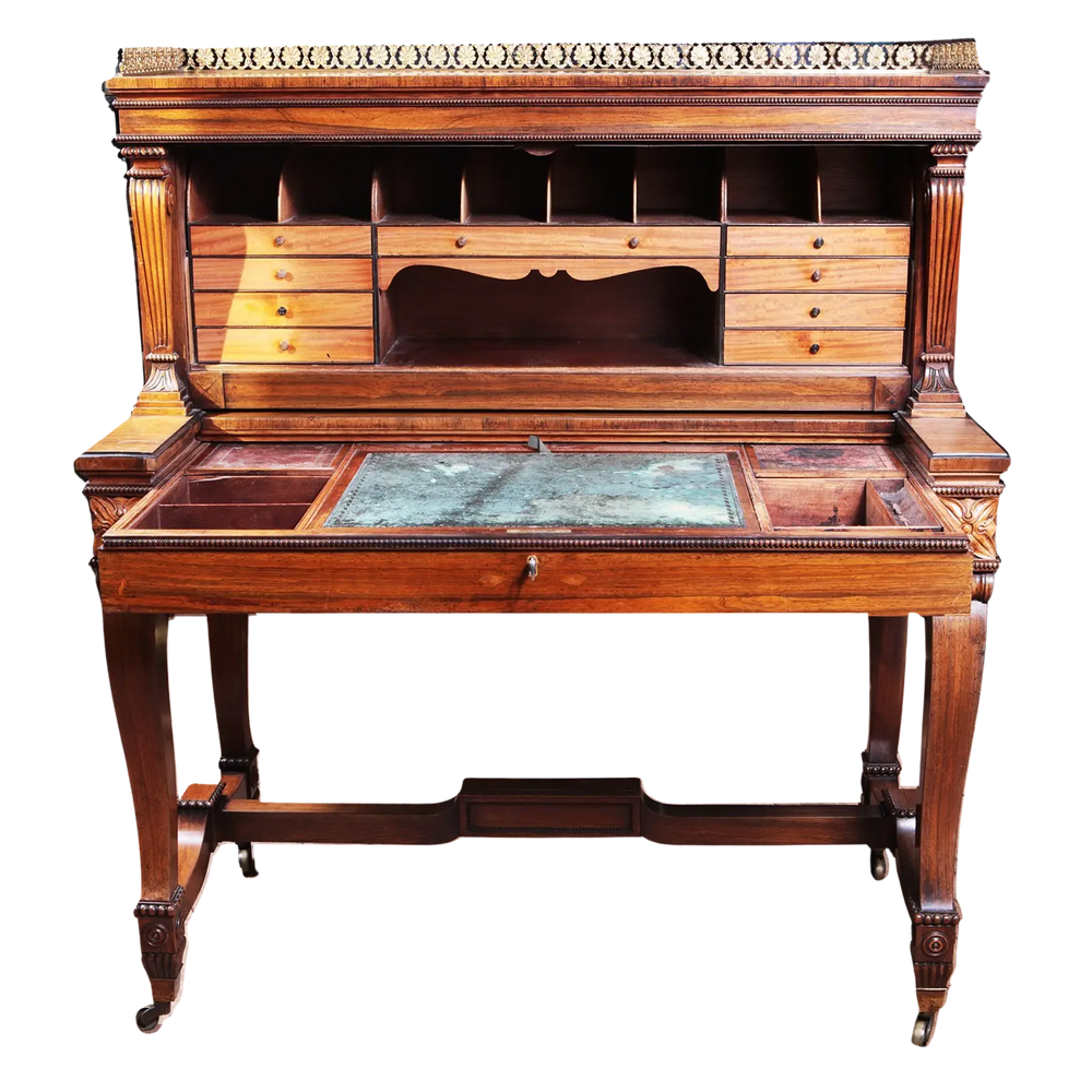 19th Century Rosewood Bureau Cabinet by Gillows with satinwood pigeon holes, secret drawers, and cabriole legs on brass castors.