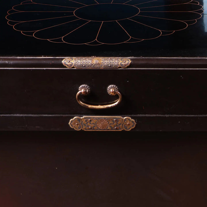 Edo Japanese Black Lacquer and Gilt Trunk close-up showing black lacquer and intricate gilt brass handle details.